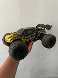 Carro RC Monster Truck 4x4 1/16 – Con Accesorios y Cargador Balanceador