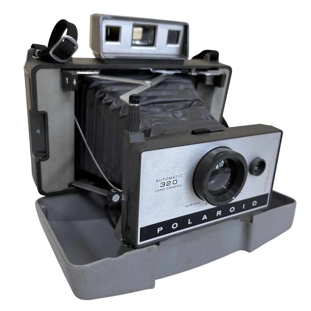 Cámara Vintage Polaroid 320 – Buenas condiciones
